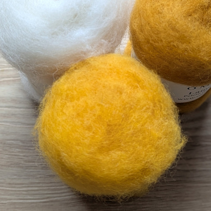 December's carded wool ball: corn